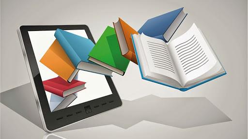 Imagen del display de una computadora y libros