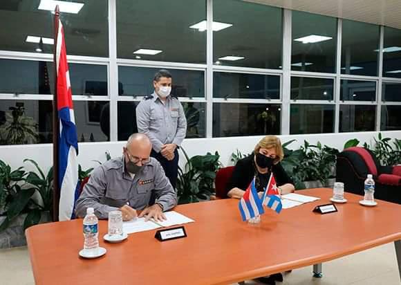 Personas que firmaron el convenio de colaboración entre la Dirección General de la PNR y la Dirección General de Bufetes Colectivos