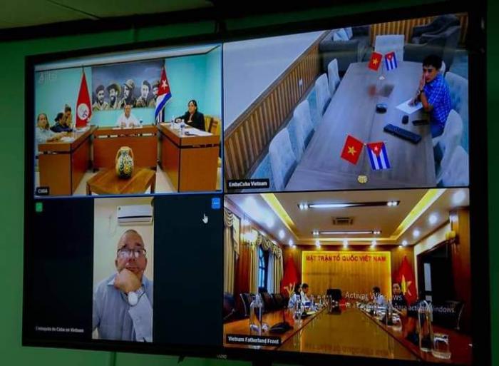 Pantalla donde se ven los participantes en el encuentro virtual entre dirigentes de los CDR nacional y de Vietnam