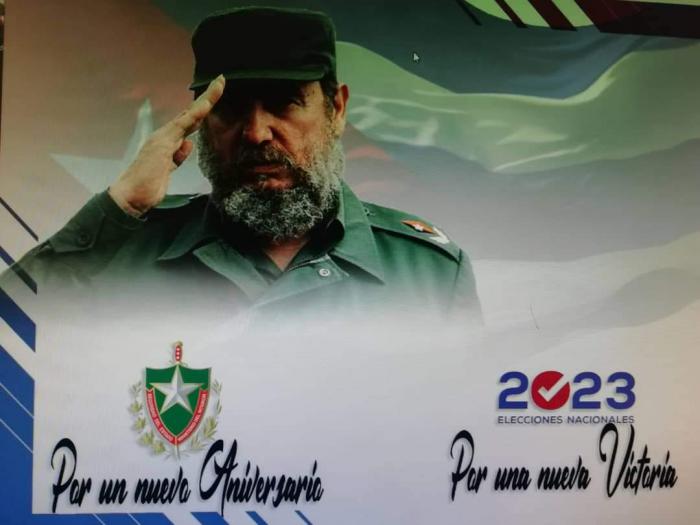 Fidel y logo del Minint