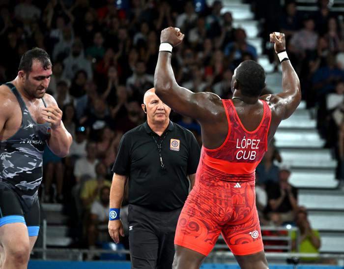 Mijaín López vence al iraní Amin Mirzazadeh